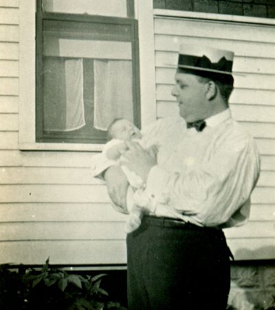 photograph of David W. Fiegenbaum holding his new daughter, Julia Evans Fiegenbaum