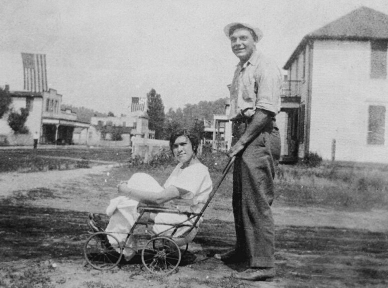 photo of Eugene Gerber given Anna (Springmeyer) a ride in a baby's stroller