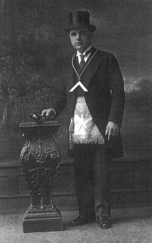 photographic studio portrait of Louis A. Gerber in his regalia as a Mason