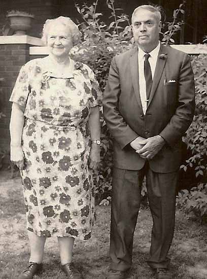 photo of Harvey & Bertha Harris standing together outside