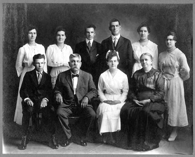 photographic studio portrait of J. W. and Dorothea (Block) Maun family