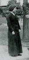 photograph from the 1914 yearbook of Elsie Hardt standing outside