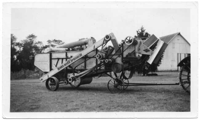 photo of a thrashing machine, 1936