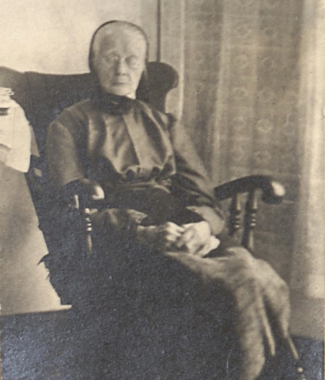 photograph of a quiet Christine (or Catherine) Elisabeth (Fiegenbaum) Wellemeyer seated in a rocking chair